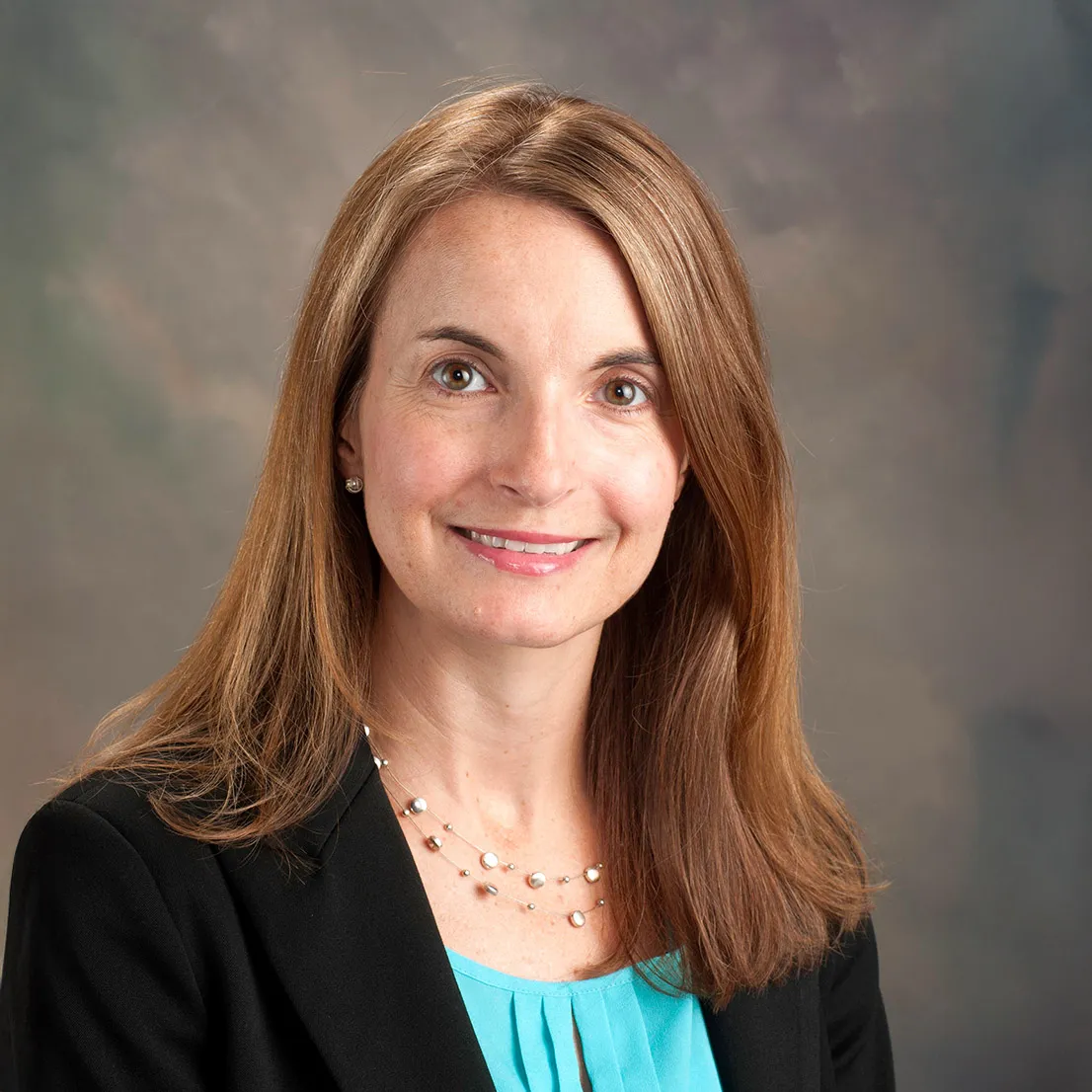 Headshot of Kelley Womack